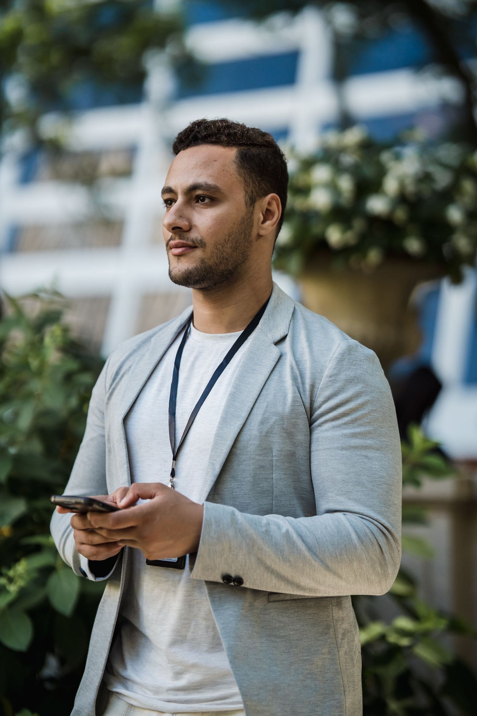Man using his phone outdoors in a park