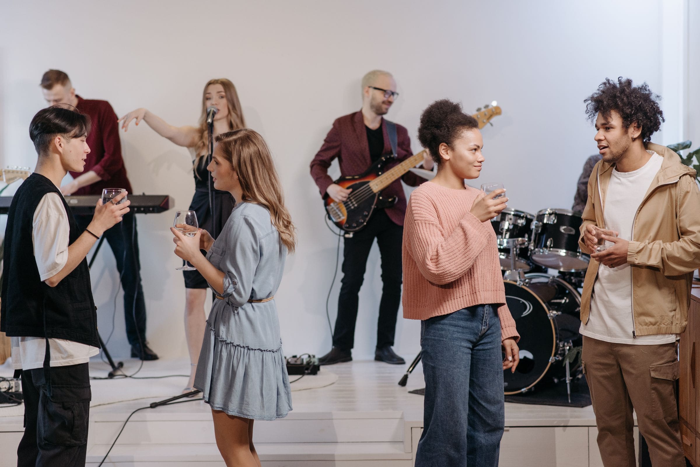 Friends talking at an intimate live music event