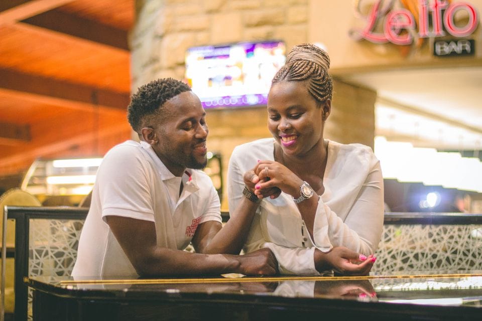 Two people sharing a moment at a café